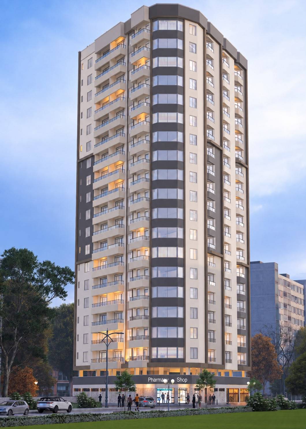 The 36 CityPark Residences tower at dusk, its curved glazed corner and stacked balconies lit from within above a street-level retail plinth.
