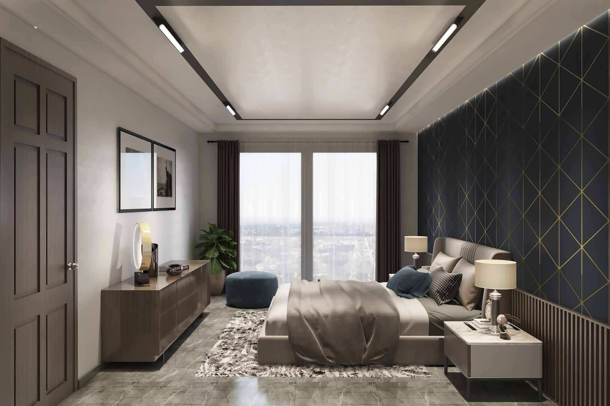 A bedroom with a dark geometric feature wall, a padded headboard and a tall window.